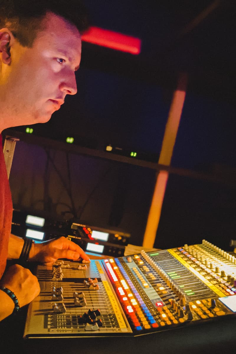 Garry Hall mixing at a large front-of-house console